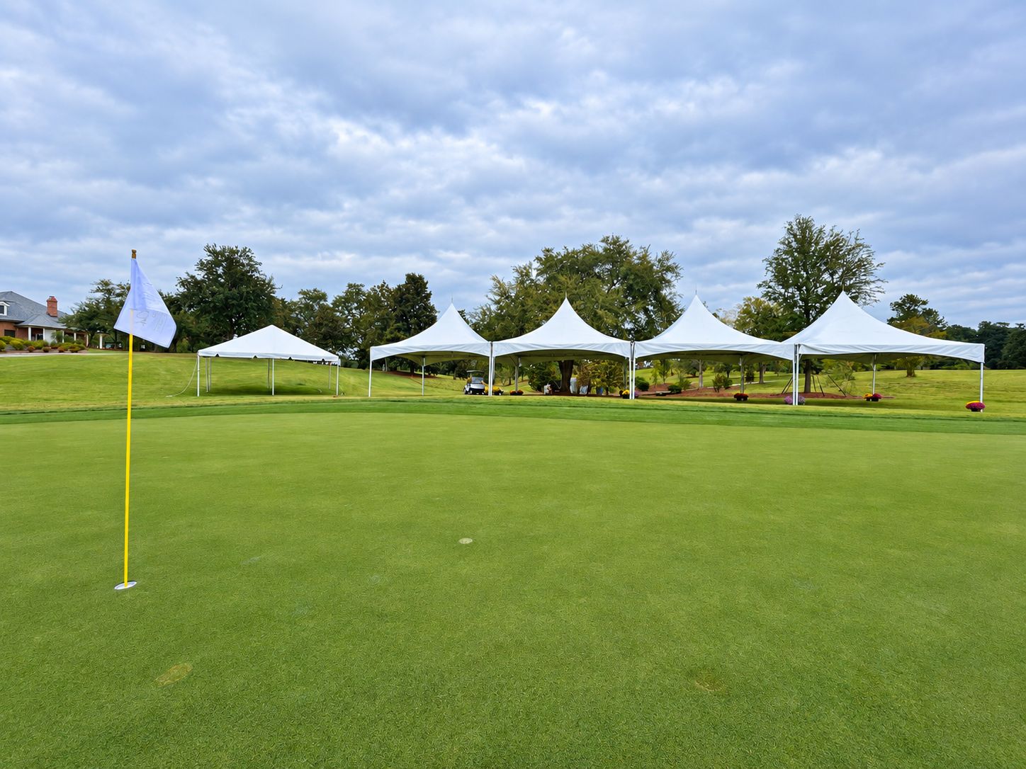 High-peak tents on a golf course